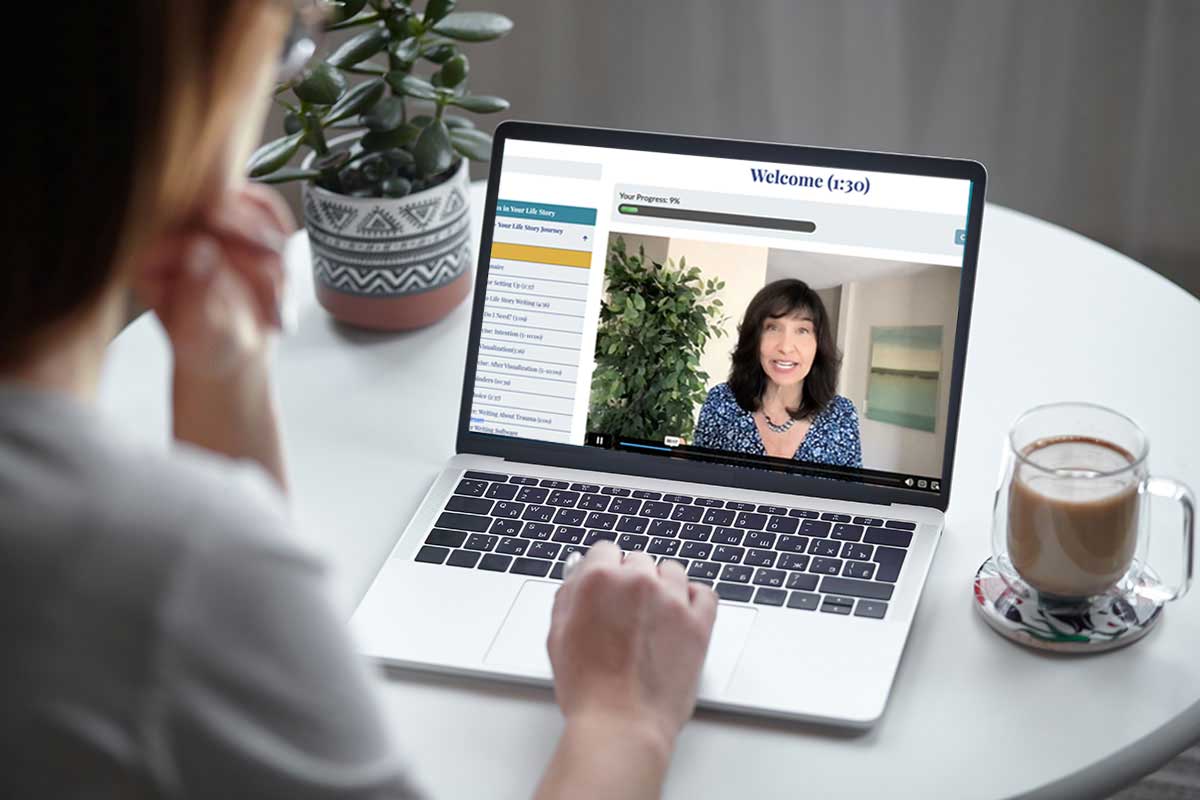 woman watching life story writing course online