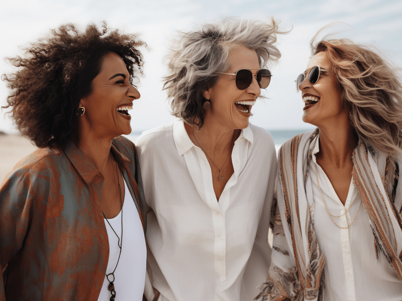 three women laughing